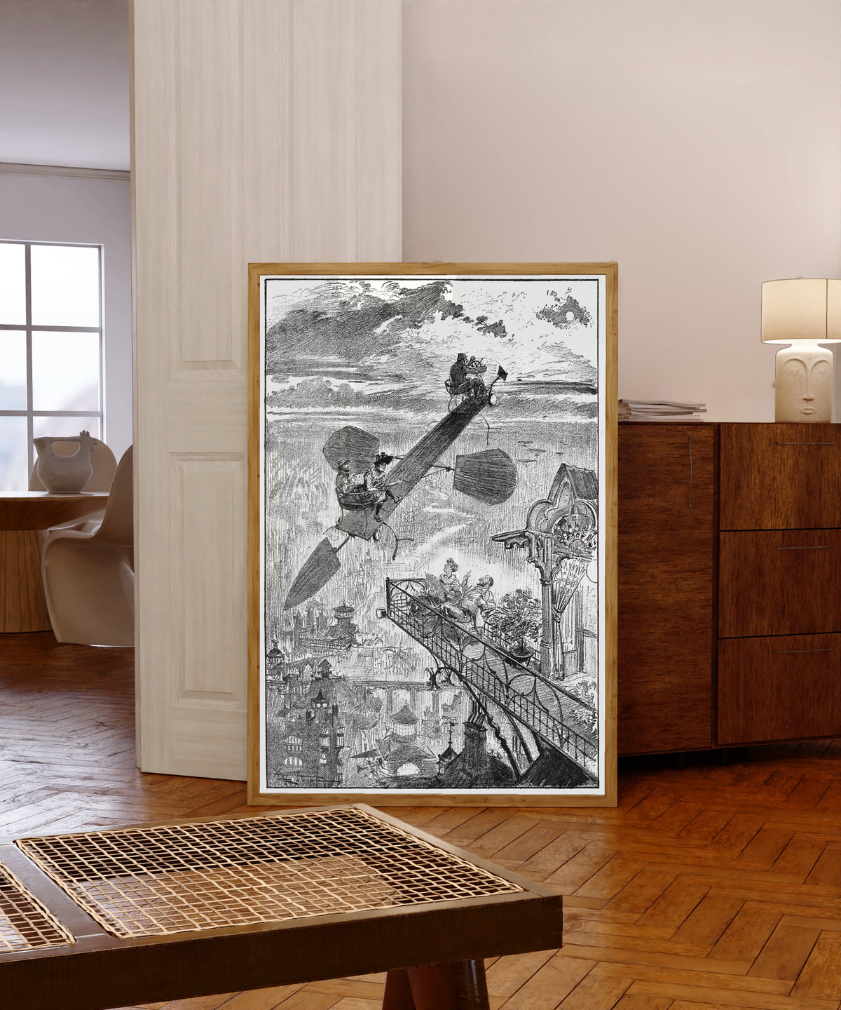 Framed art print of On respire la fraîcheur du soir by Albert Robida, in a light wood frame leaning in a warm room with a parquet floor