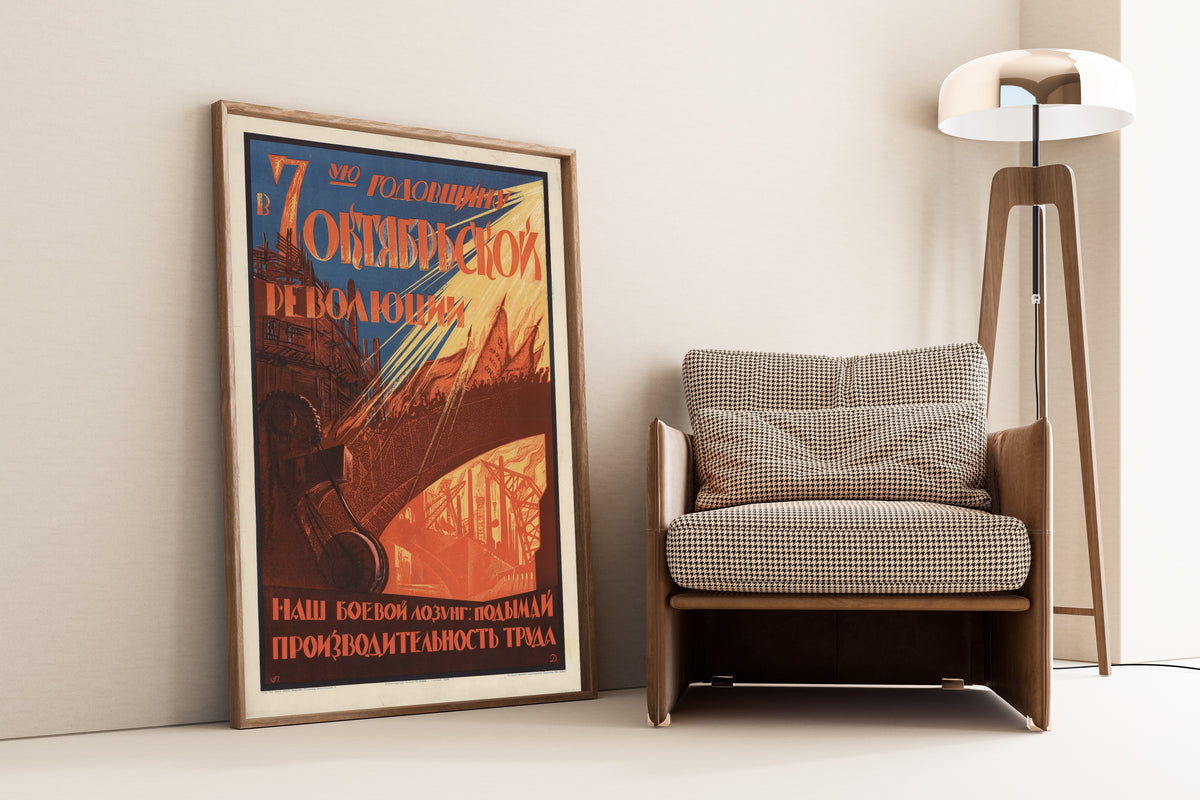 Framed art print of On the Seventh Anniversary of the October Revolution, leaning against a wall beside an armchair and a floor lamp