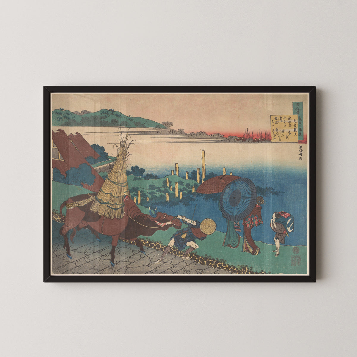 Framed art print of One Hundred Poems Explained by the Nurse: Poem by Motoyoshi Shinnō by Katsushika Hokusai, in a black frame on a pale wall