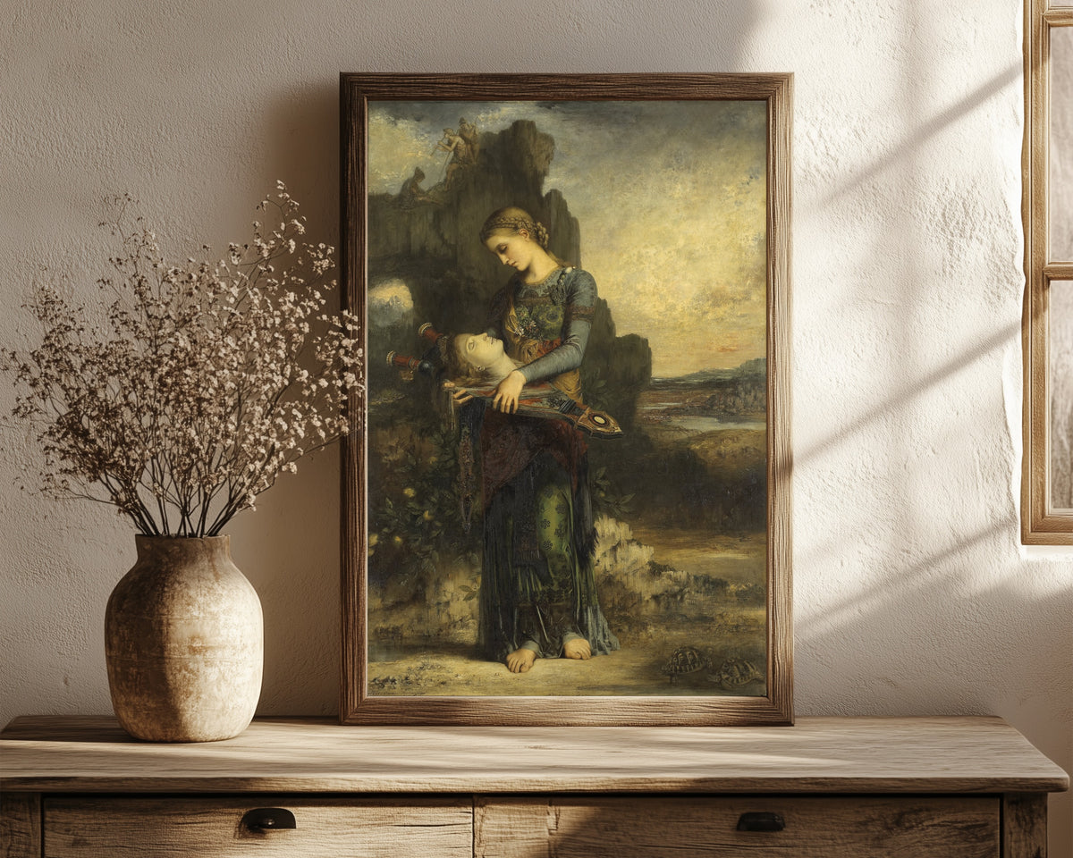 Framed art print of Orpheus by Gustave Moreau, in a dark wood frame leaning on a rustic console beside dried flowers