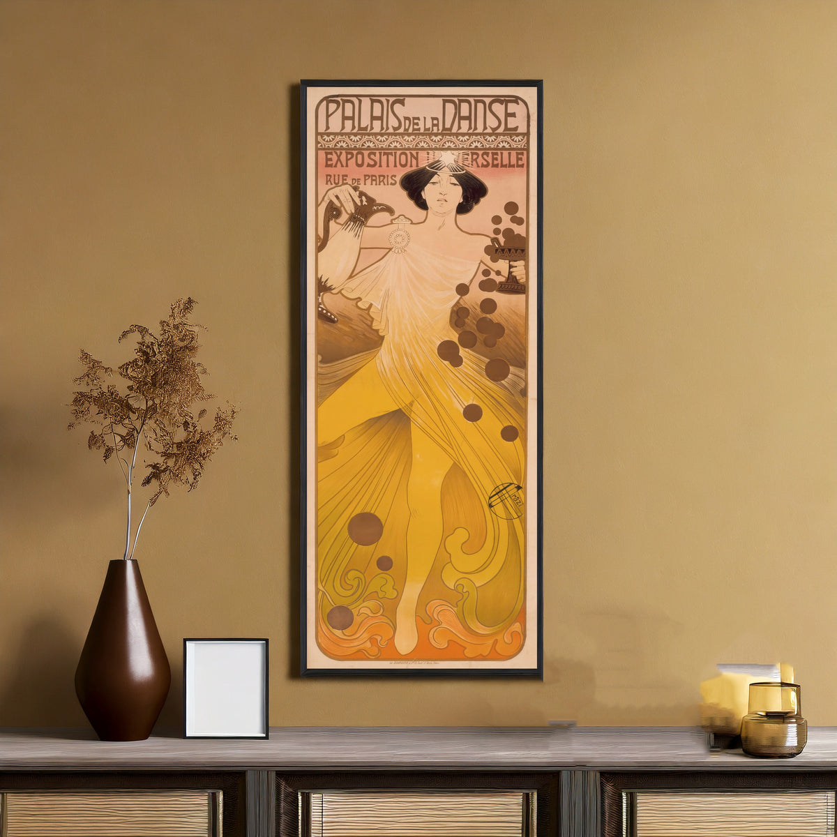 Framed art print of Palais de la Danse, Exposition Universelle by Manuel Orazi, on an ochre wall above a console table