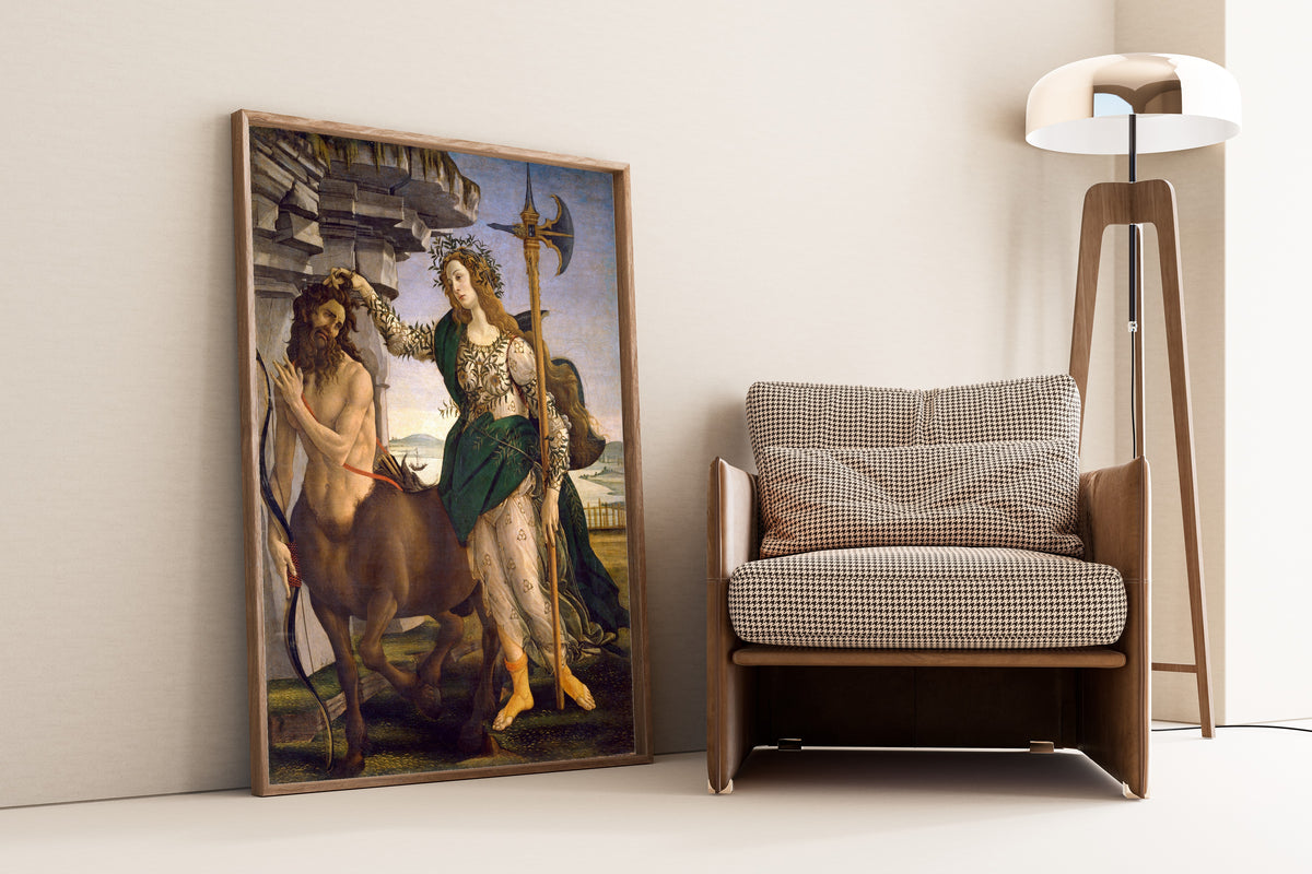 Framed art print of Pallas and the Centaur by Sandro Botticelli, leaning against a wall beside an armchair and a floor lamp