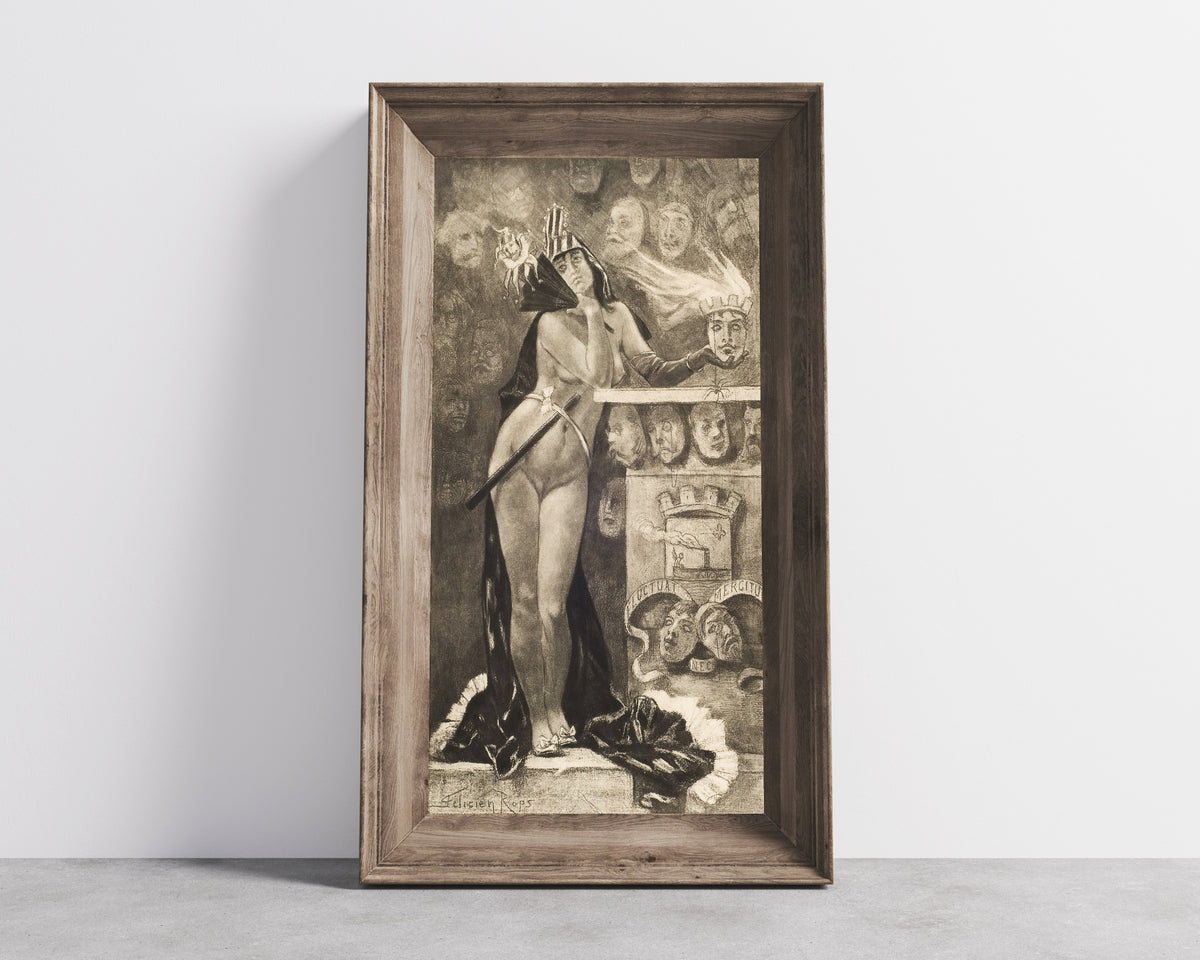 Framed art print of Parisian Masks by Félicien Rops, in a wide wooden frame leaning against a concrete wall
