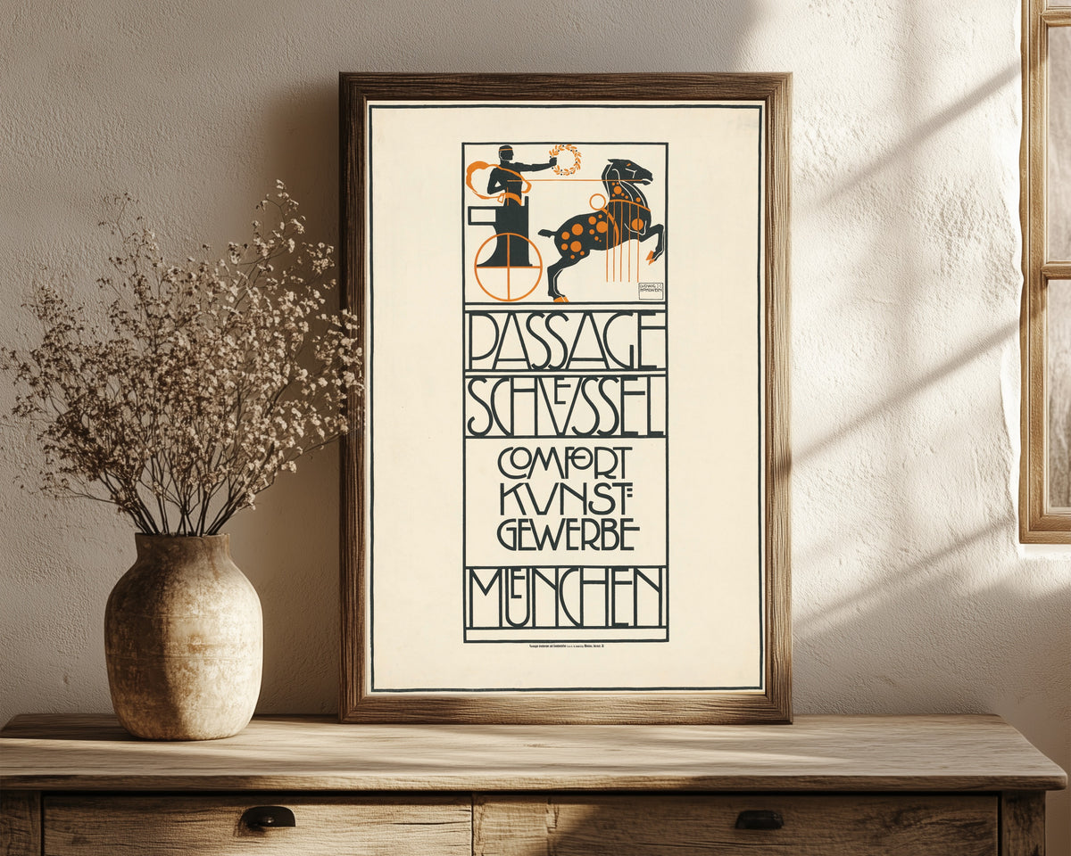 Framed art print of Passage Schüssel: Comfort Kunstgewerbe, München by Ludwig Hohlwein, in a dark wood frame leaning on a rustic console beside dried flowers