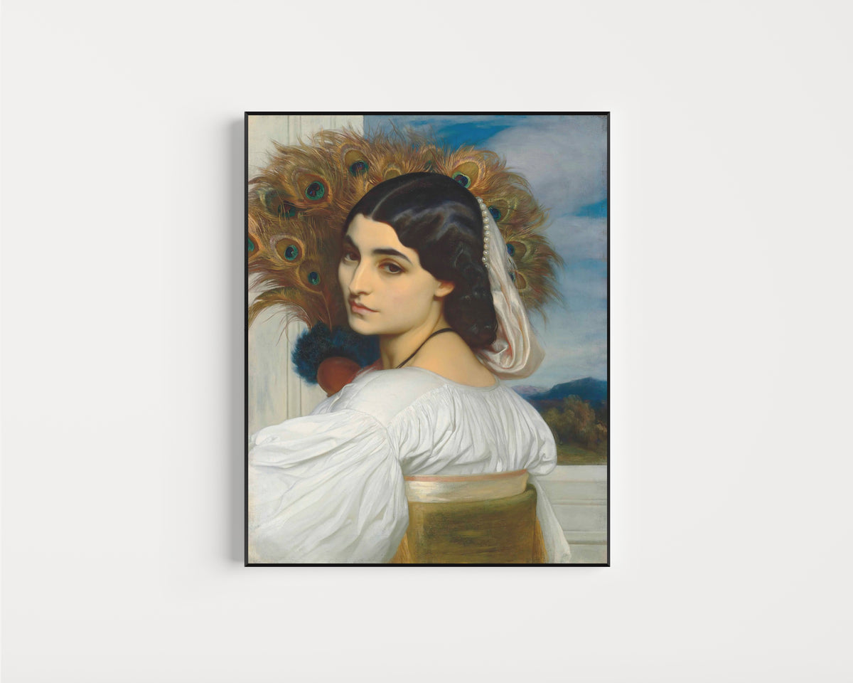 Framed art print of Pavonia by Frederic Leighton, in a slim black frame on a plain white wall