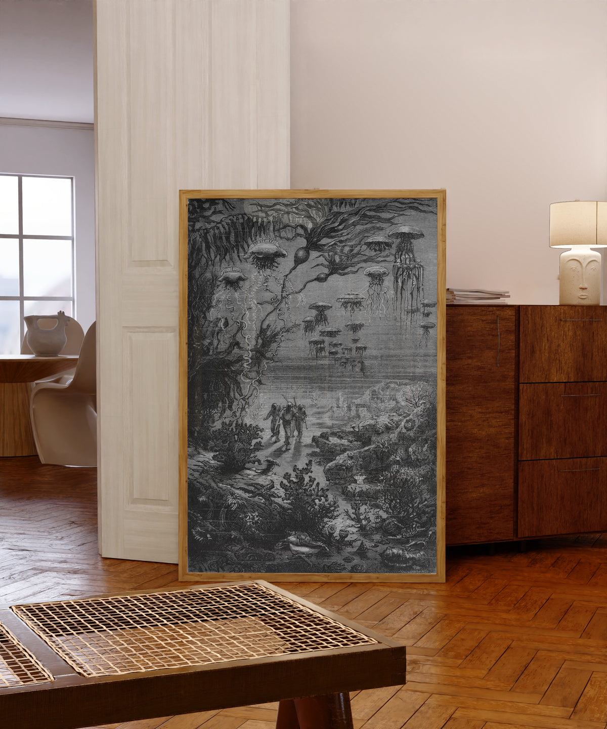 Framed art print of Paysage sous-marin de l'île Crespo (Underwater… by Alphonse de Neuville, in a light wood frame leaning in a warm room with a parquet floor