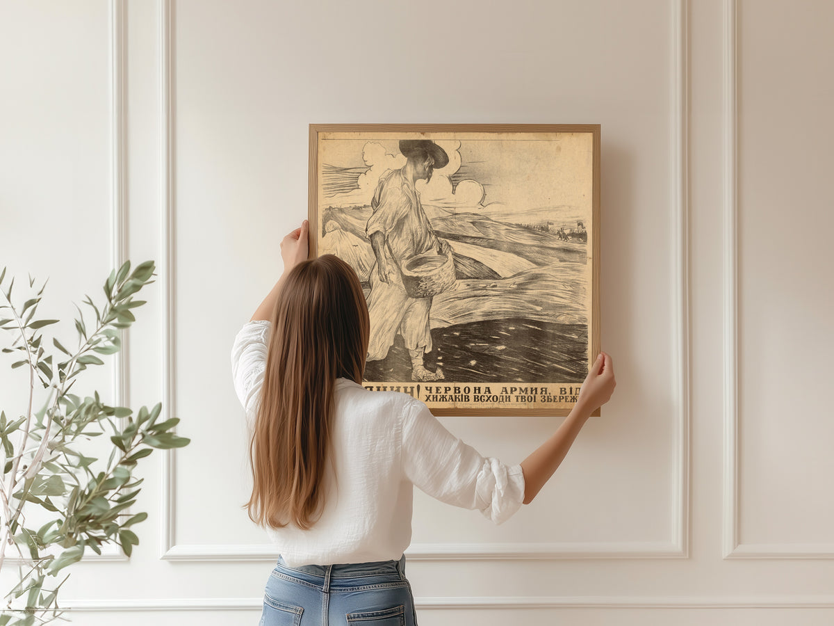 Framed art print of Peasant! The Red Army Will Protect Your Crops from the Predators, hung on a panelled wall