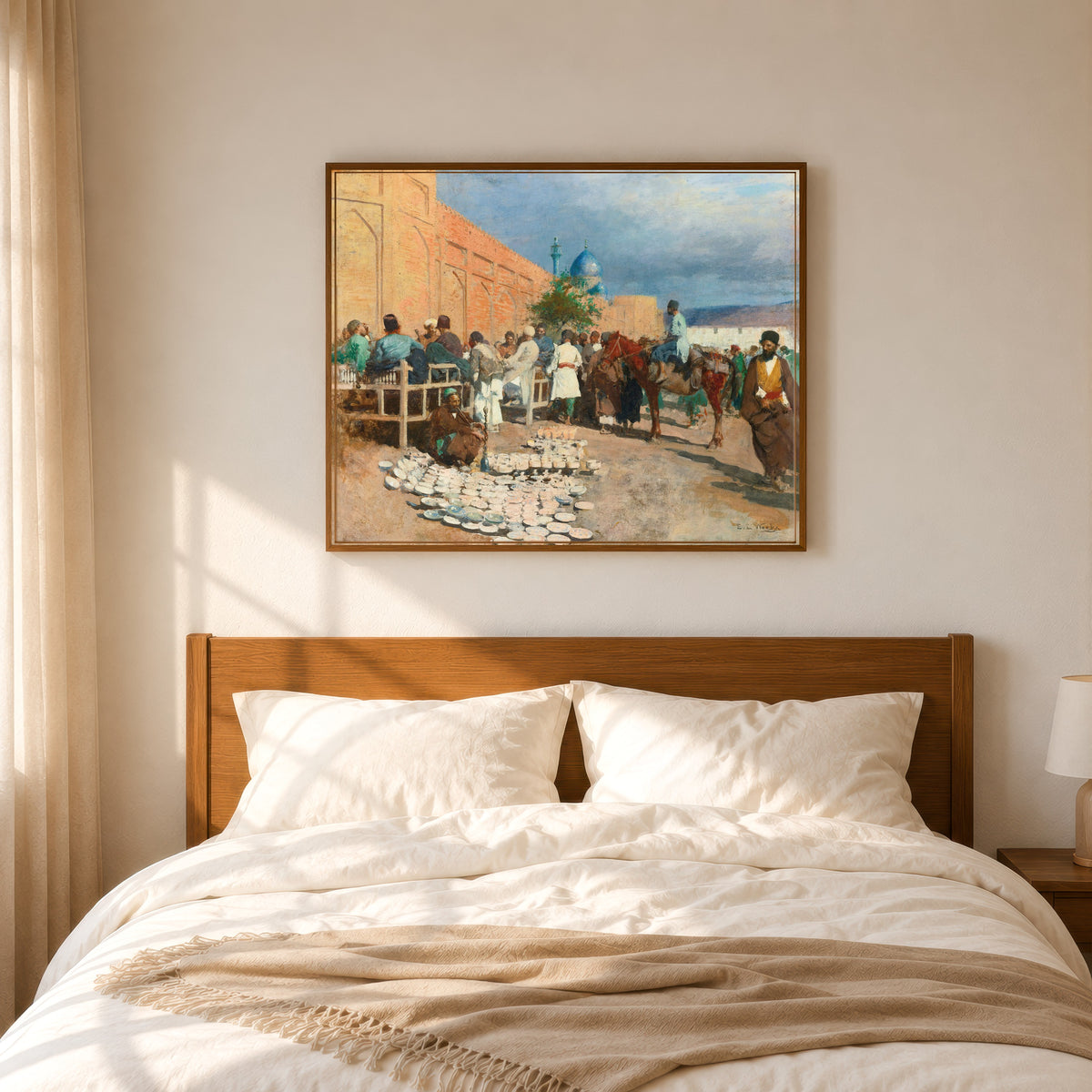 Framed art print of The Pottery Seller by Edwin Lord Weeks, in a slim wood frame above a bed in a sunlit bedroom