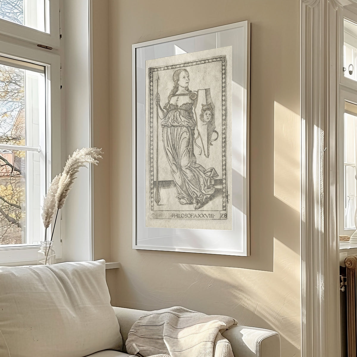 Framed art print of Philosophy (from the Tarocchi, Series C: Liberal Arts, no. 28) by Master of the E-Series Tarocchi, in a sunlit living room above a sofa