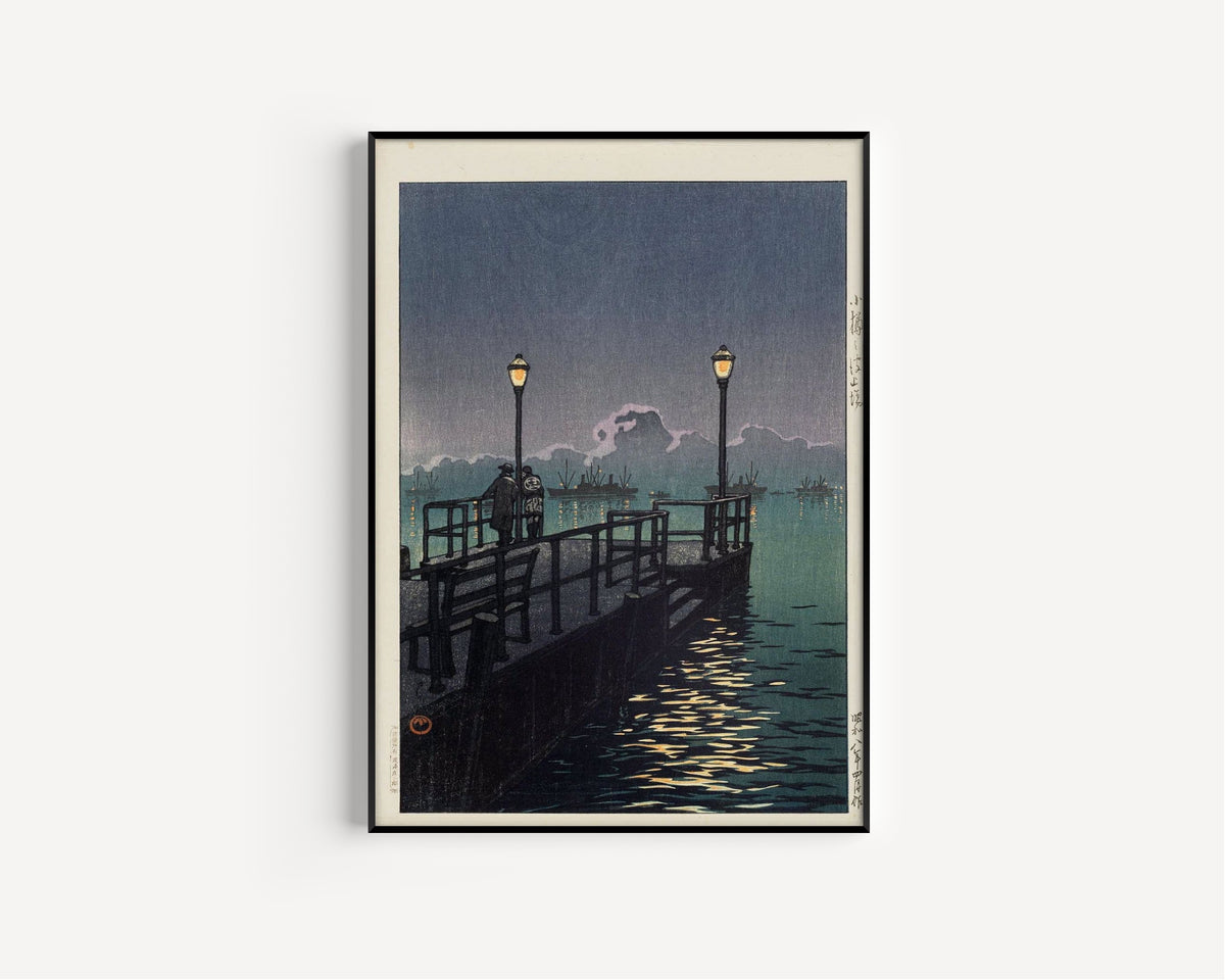 Framed art print of Pier at Otaru by Kawase Hasui, in a slim black frame on a plain white wall