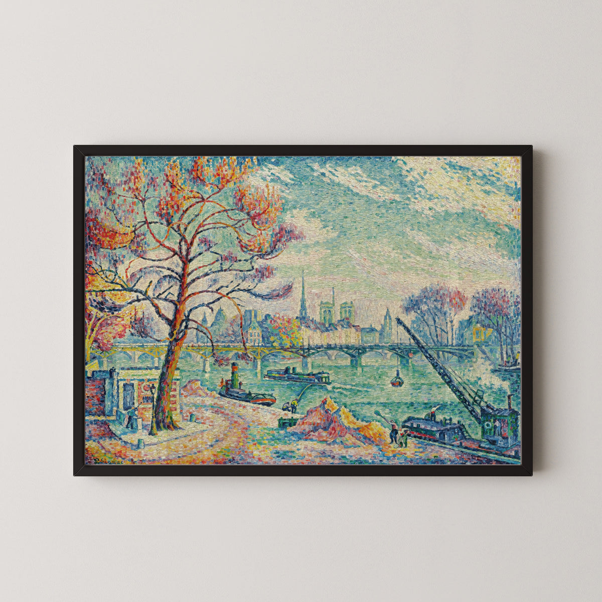 Framed art print of Pont des Arts, Paris by Paul Signac, in a black frame on a pale wall