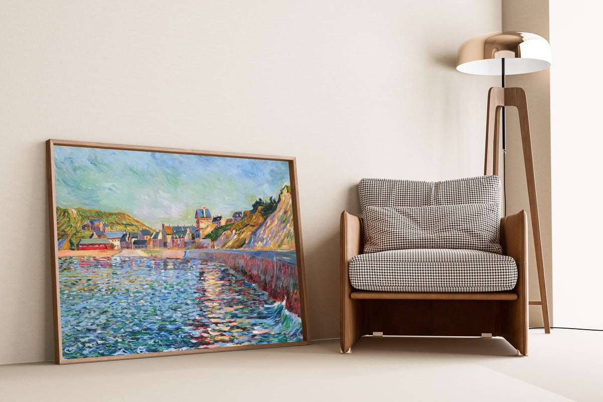 Framed art print of Port-en-Bessin, The Outer Harbour by Paul Signac, leaning against a wall beside an armchair and a floor lamp