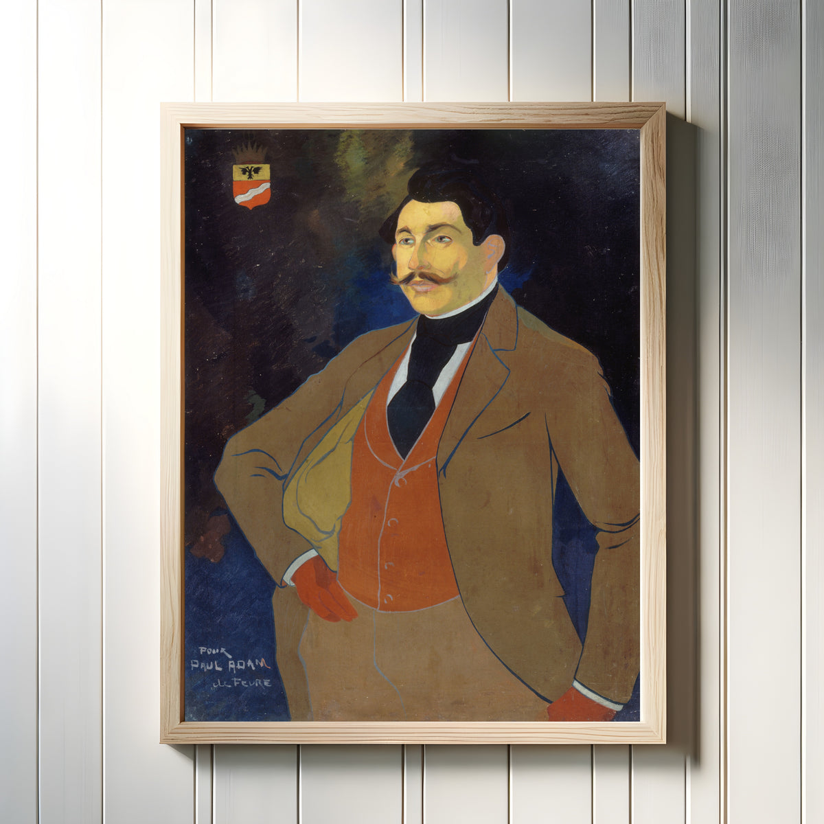 Framed art print of Portrait de Paul Adam by Georges de Feure, in a light wood frame on a white panelled wall