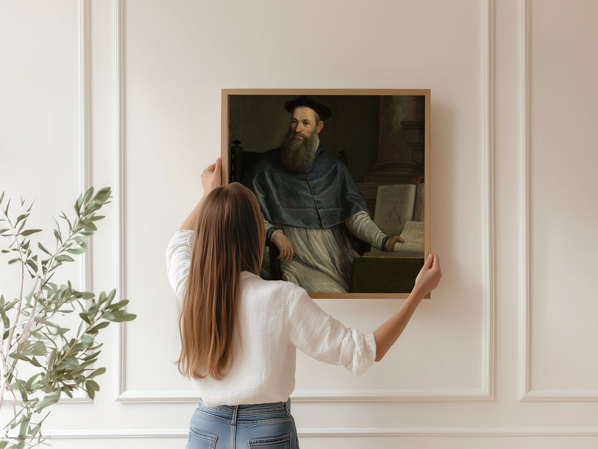 Framed art print of Portrait of Daniele Barbaro by Paolo Veronese, hung on a panelled wall