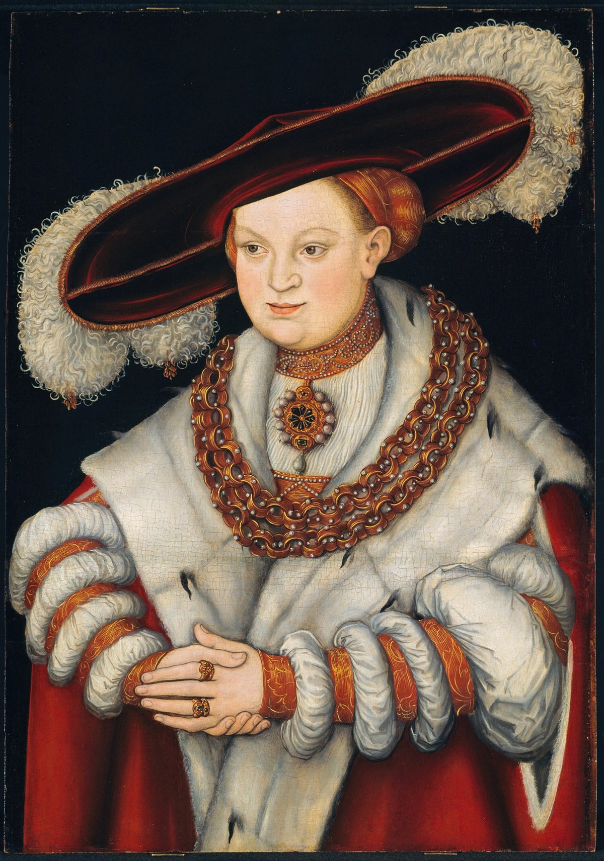 Portrait of Magdalena of Saxony, Wife of Elector Joachim II of Brandenburg by Lucas Cranach the Elder — A woman in a vast plumed red hat, ermine and heavy gold