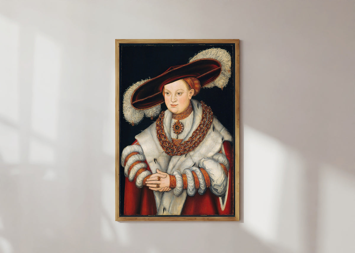 Framed art print of Portrait of Magdalena of Saxony, Wife of Elector Joachim II of… by Lucas Cranach the Elder, in a light wood frame on a sunlit white wall