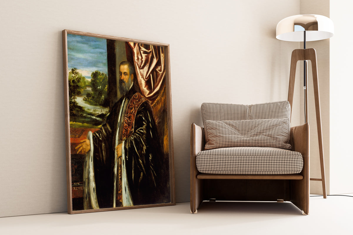 Framed art print of Portrait of Marino Grimani by Tintoretto, leaning against a wall beside an armchair and a floor lamp