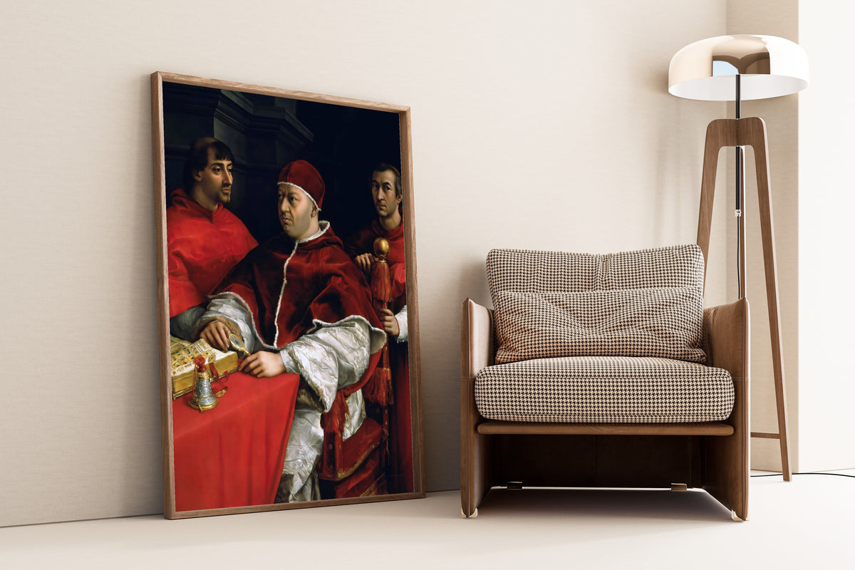 Framed art print of Portrait of Pope Leo X with Cardinals Giulio de’ Medici and Luigi… by Raphael, leaning against a wall beside an armchair and a floor lamp