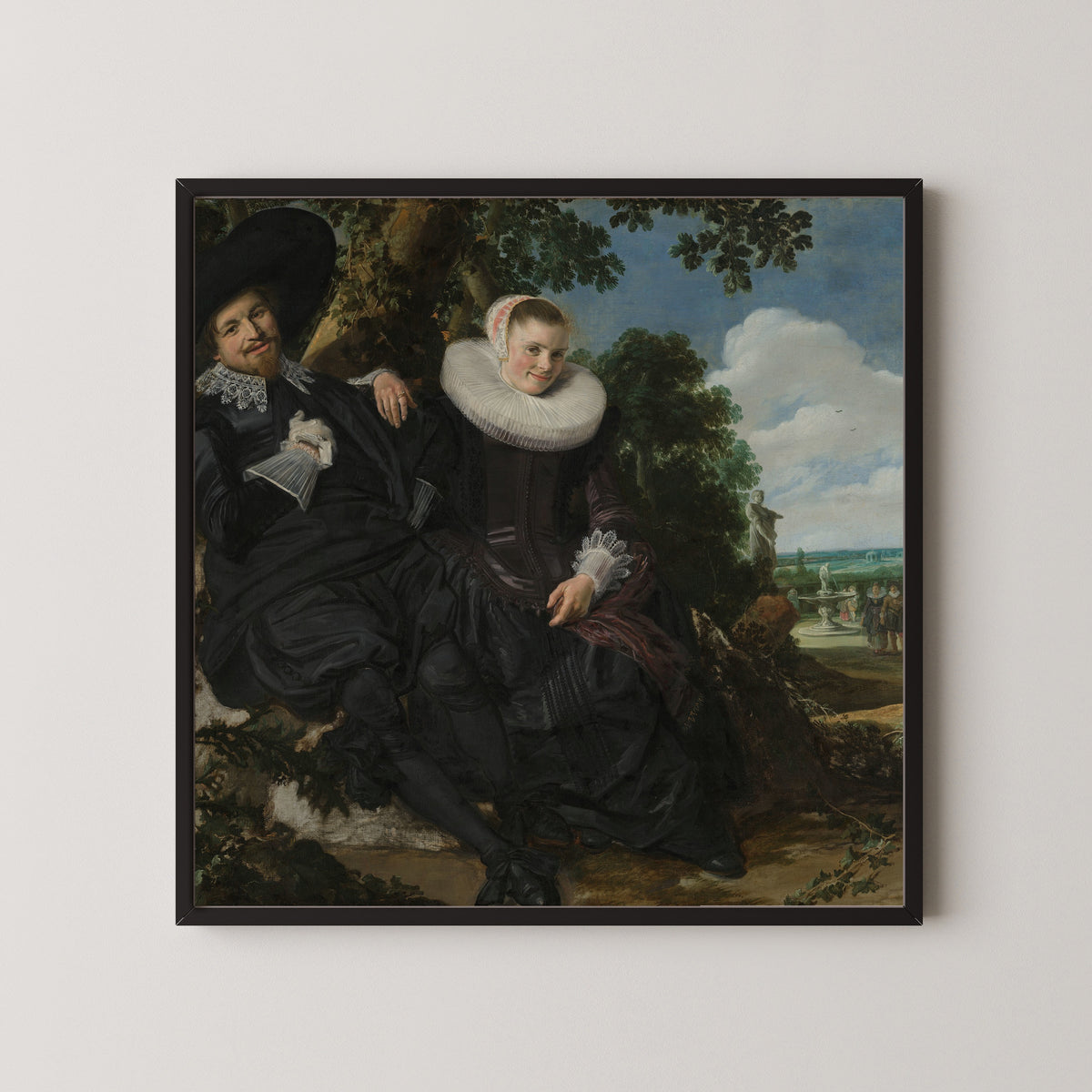 Framed art print of Portrait of a Couple, Probably Isaac Abrahamsz Massa and Beatrix van der Laen by Frans Hals, in a black frame on a pale wall