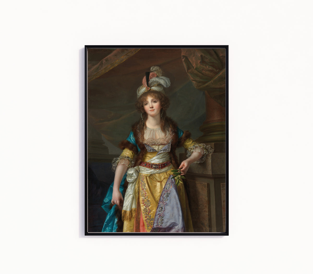 Framed art print of Portrait of a Lady in Turkish Fancy Dress by Jean-Baptiste Greuze, in a slim black frame on a plain white wall