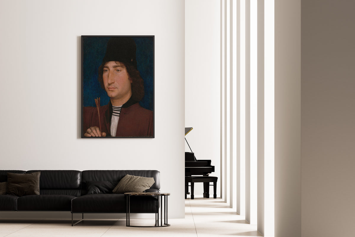 Framed art print of Portrait of a Man with an Arrow by Hans Memling, on the wall of a minimal living room