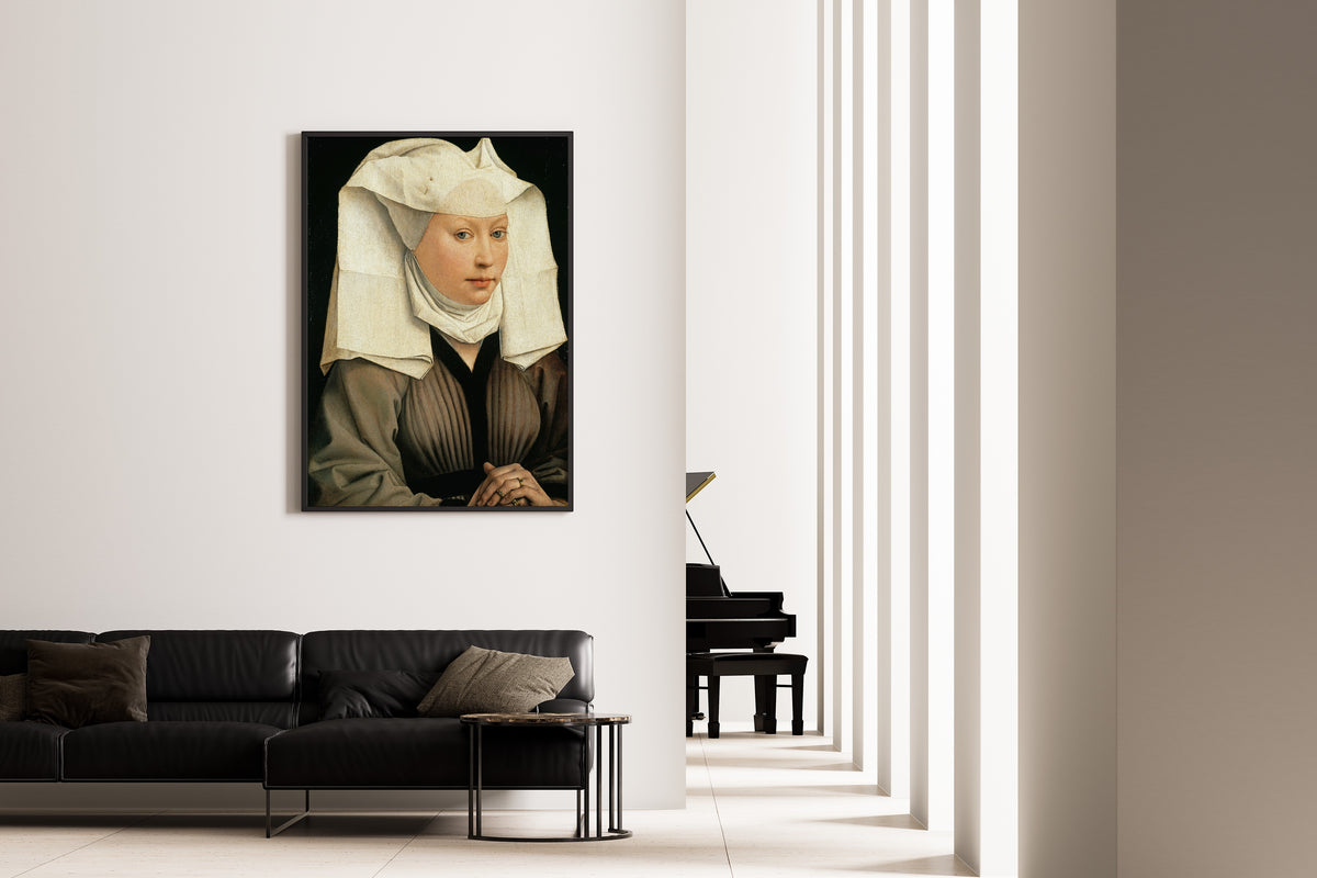 Framed art print of Portrait of a Woman by Rogier van der Weyden, on the wall of a minimal living room