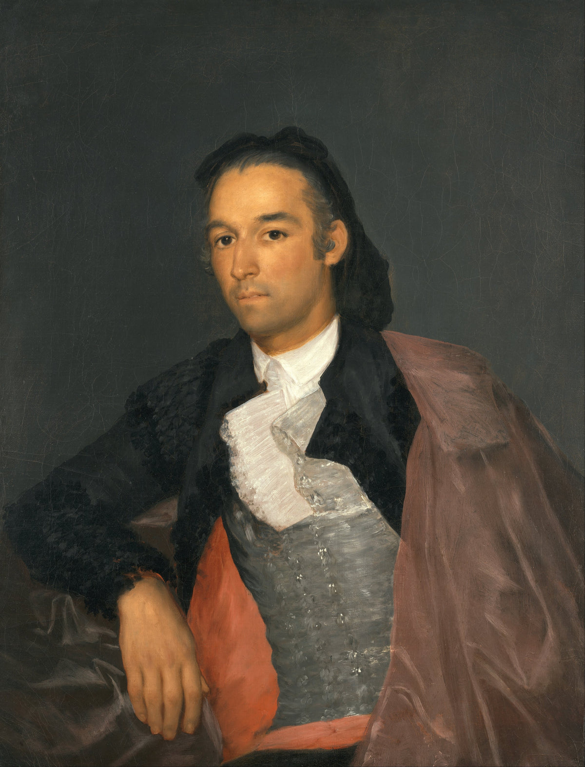 Portrait of the Matador Pedro Romero by Francisco de Goya — A matador in a mauve cape with coral lining, hand at rest