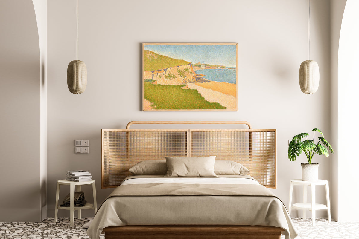 Framed art print of Portrieux, Tertre Denis by Paul Signac, above a cane-headboard bed