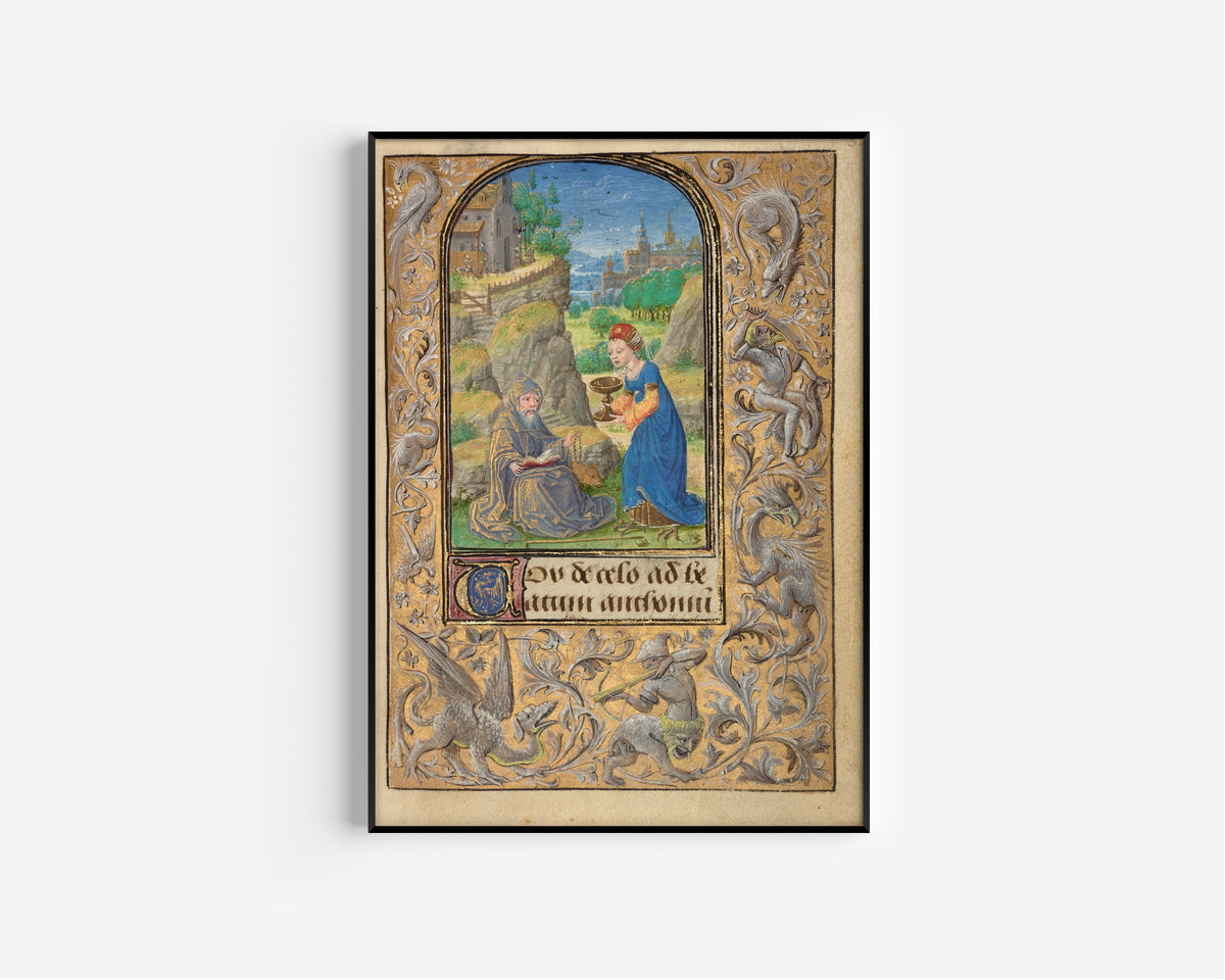 Framed art print of Prayer Book of Charles the Bold: The Temptation of Saint Anthony by Lieven van Lathem, in a slim black frame on a plain white wall
