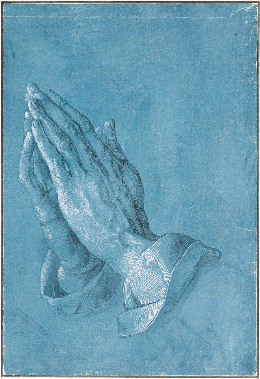 Albrecht Dürer — Praying Hands | Fine Art Print shown to scale on a wall above a sofa