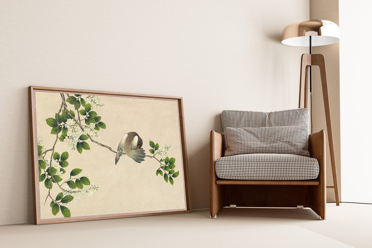 Desk Album: Flower and Bird Paintings (Preening Bird) by Zhang Ruoai — framed and leaning against a wall beside an armchair and a floor lamp