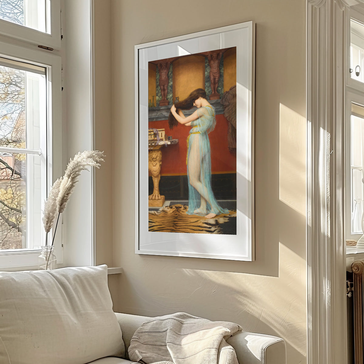 Framed art print of Preparing for the Bath by John William Godward, in a sunlit living room above a sofa