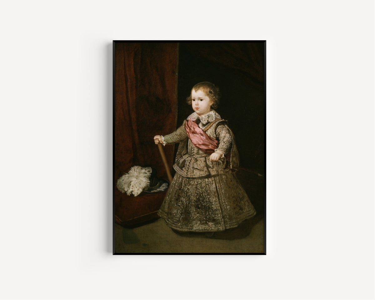 Framed art print of Prince Baltasar Carlos in Silver by Diego Velázquez, in a slim black frame on a plain white wall