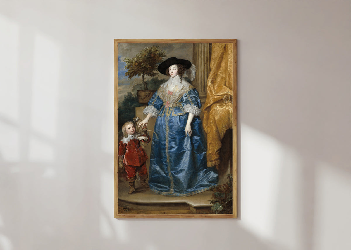 Framed art print of Queen Henrietta Maria with Sir Jeffrey Hudson by Anthony van Dyck, in a light wood frame on a sunlit white wall