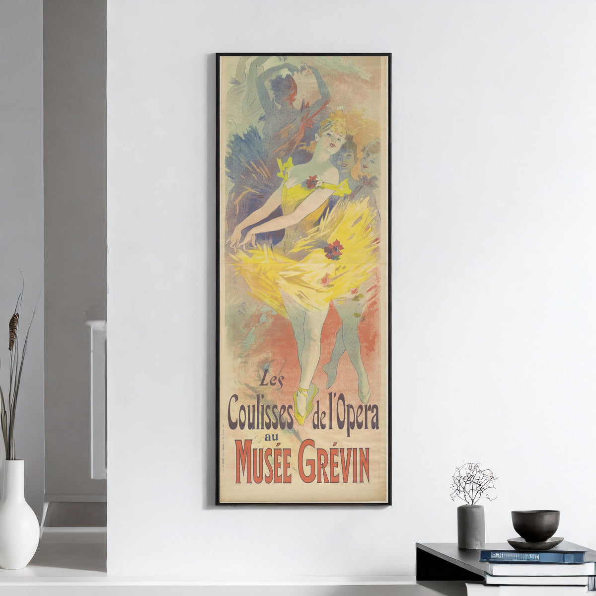 Coulisses de l'opéra au Musée Grévin by Jules Chéret — framed on a white wall above books and a bowl