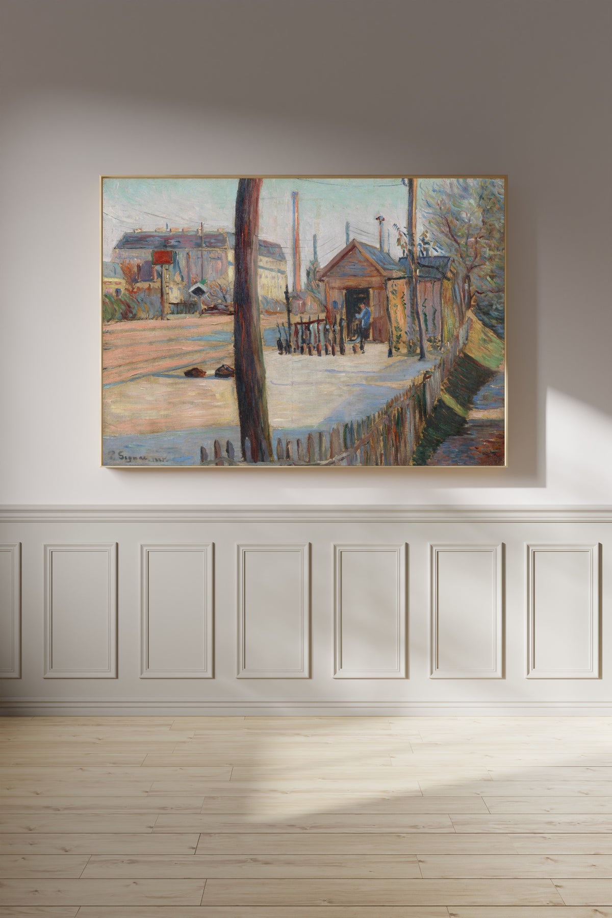 Framed art print of Railway Junction near Bois-Colombes by Paul Signac, on a panelled wall in afternoon light