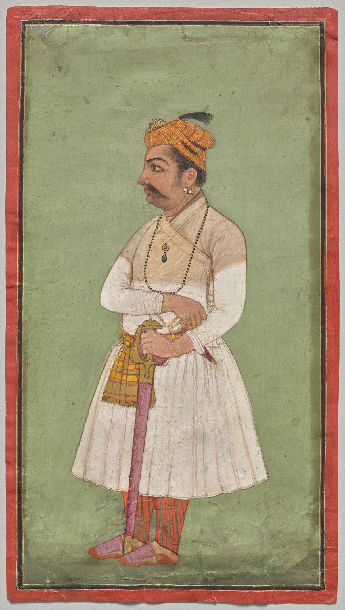 Raja Hari Sen of Mandi by Pahari school — A standing raja in white, his hands on a gold sword hilt