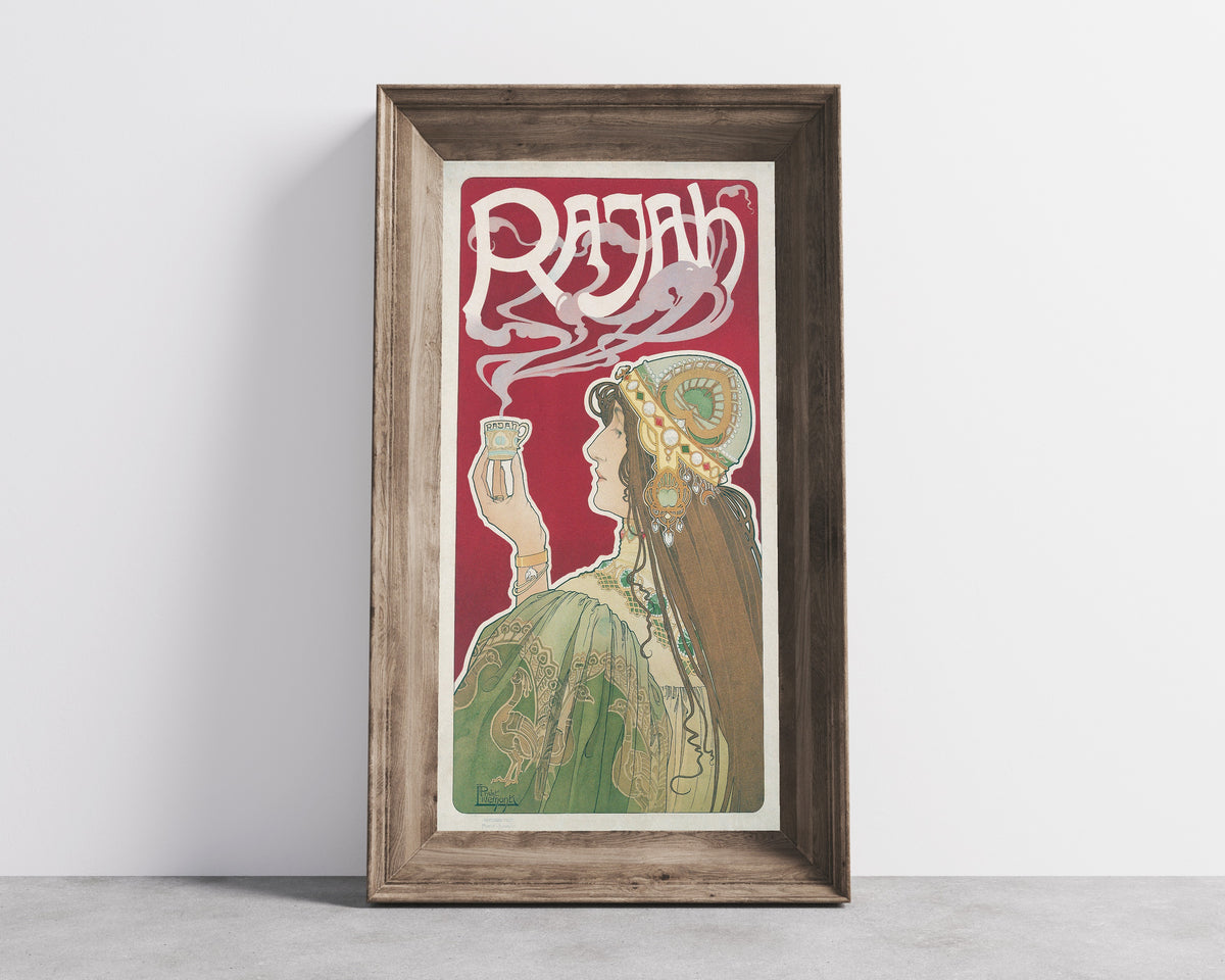 Framed art print of Rajah by Henri Privat-Livemont, in a wide wooden frame leaning against a concrete wall