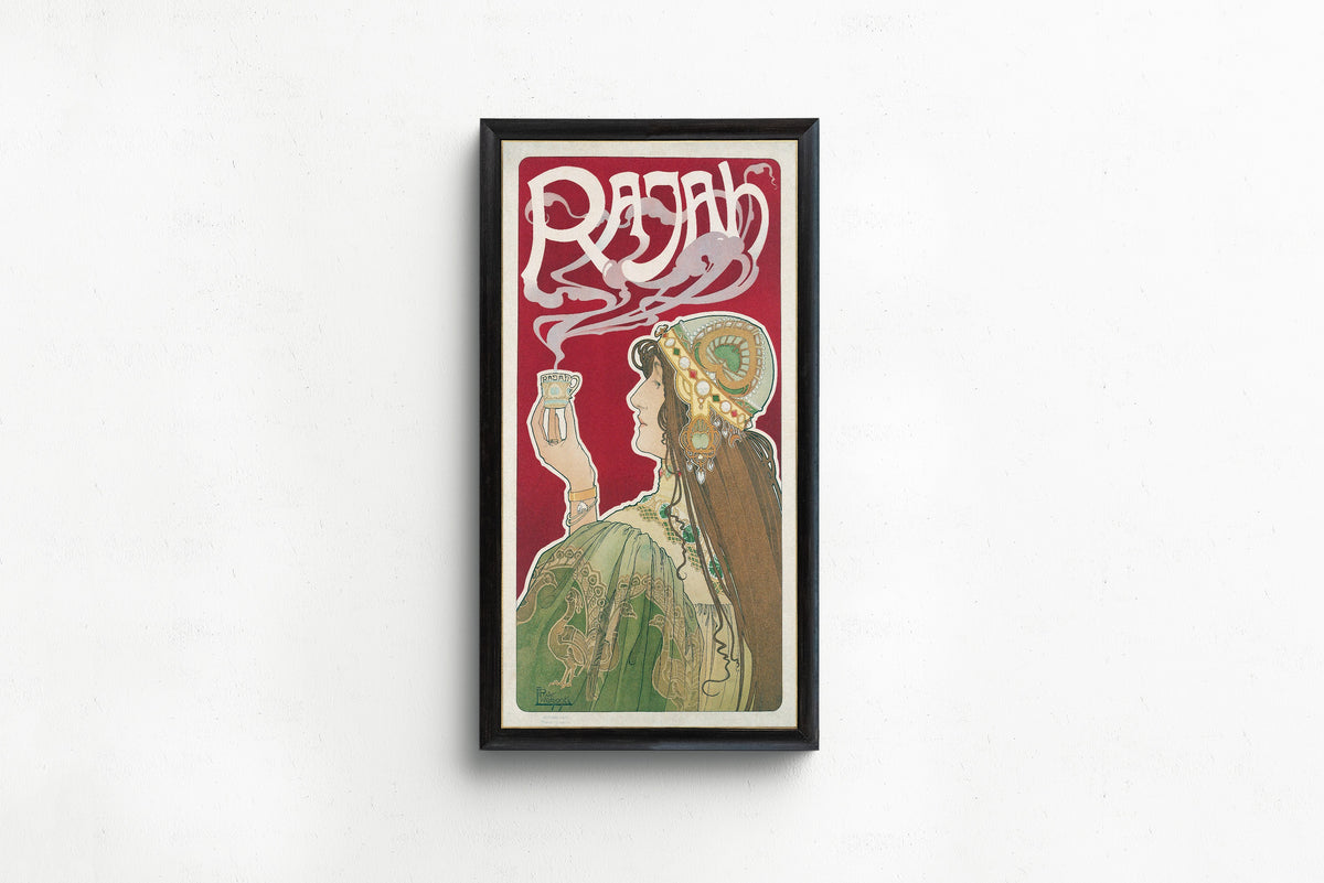 Framed art print of Rajah by Henri Privat-Livemont, in a slim black frame on a plain white wall