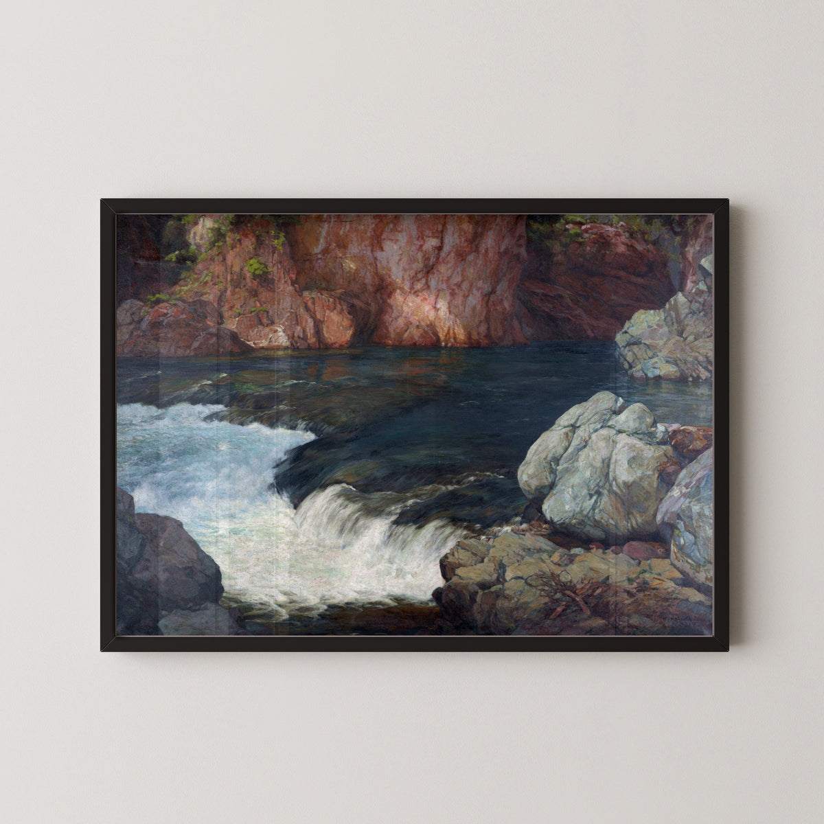 Framed art print of Rapids (1910) by Hiroshi Yoshida, in a black frame on a pale wall