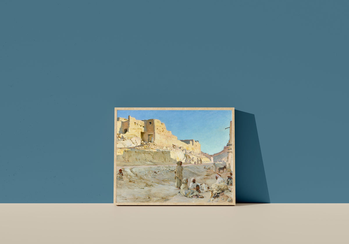 Framed art print of Repos à l'ombre, Bou Saâda by Étienne Dinet, in a light wood frame leaning on a blue wall