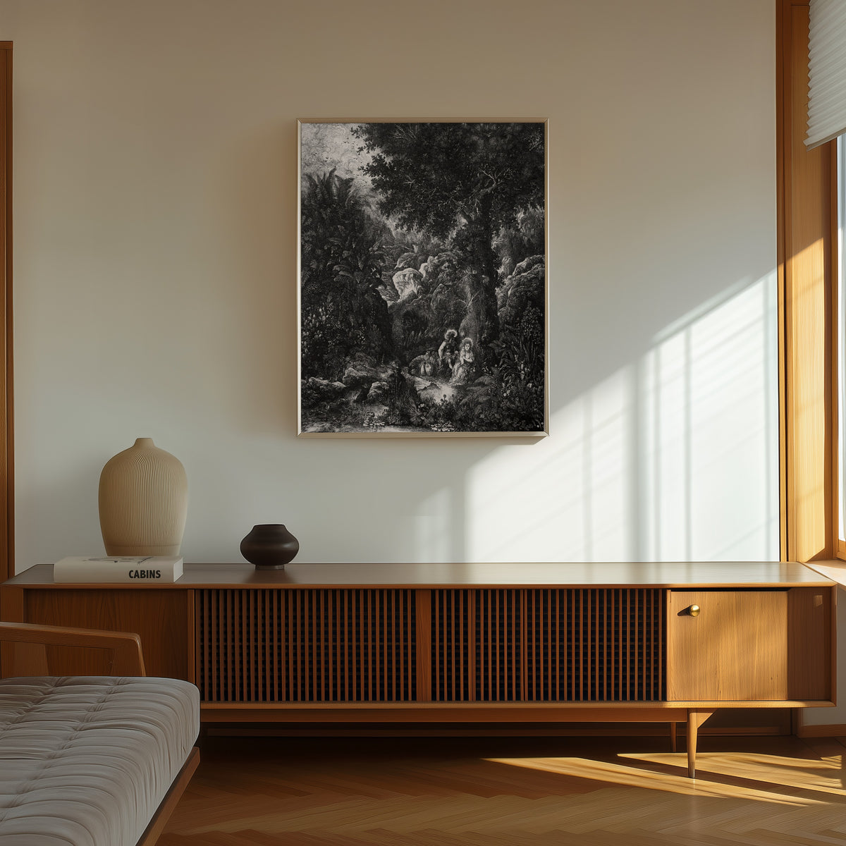 Framed art print of Rest on the Flight into Egypt with a Saddled Donkey by Rodolphe Bresdin, in a thin light frame on a sunlit wall above a wooden sideboard