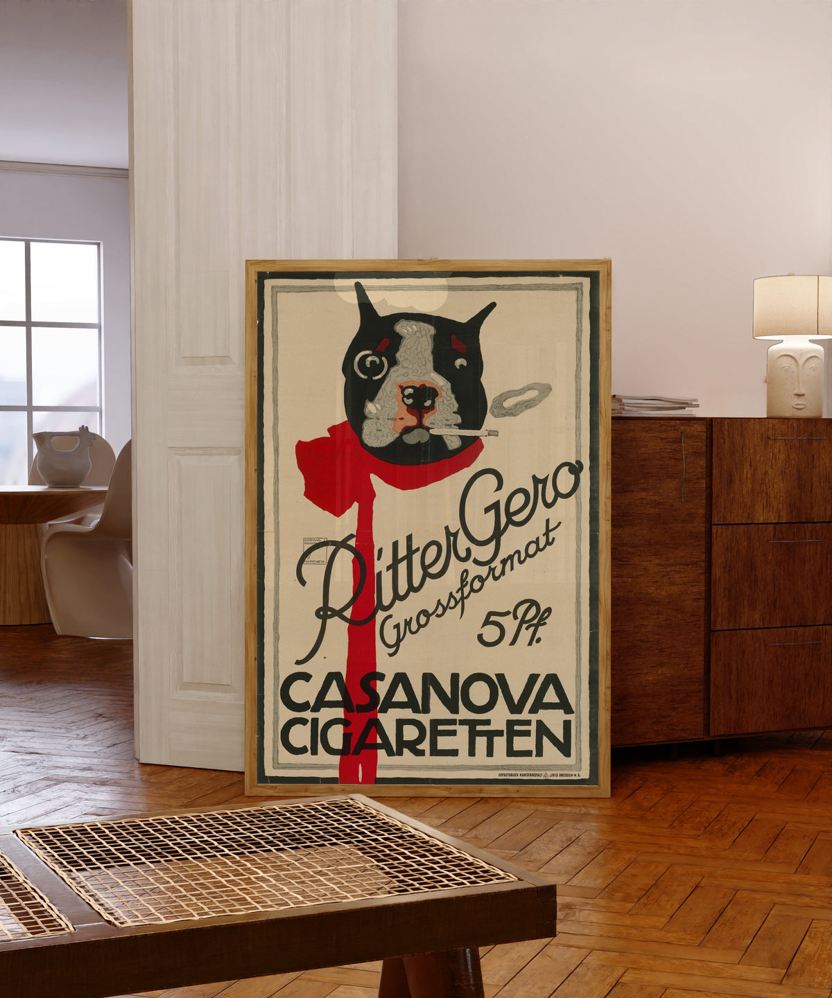 Framed art print of Ritter Gero Grossformat: Casanova Cigaretten by Ludwig Hohlwein, in a light wood frame leaning in a warm room with a parquet floor