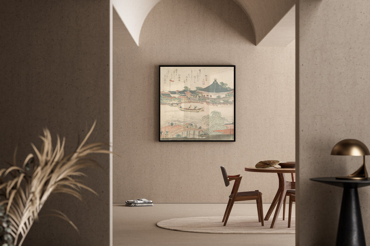 Framed art print of River Scene with Bridge in Foreground by Katsushika Hokusai, in a sunlit dining corner