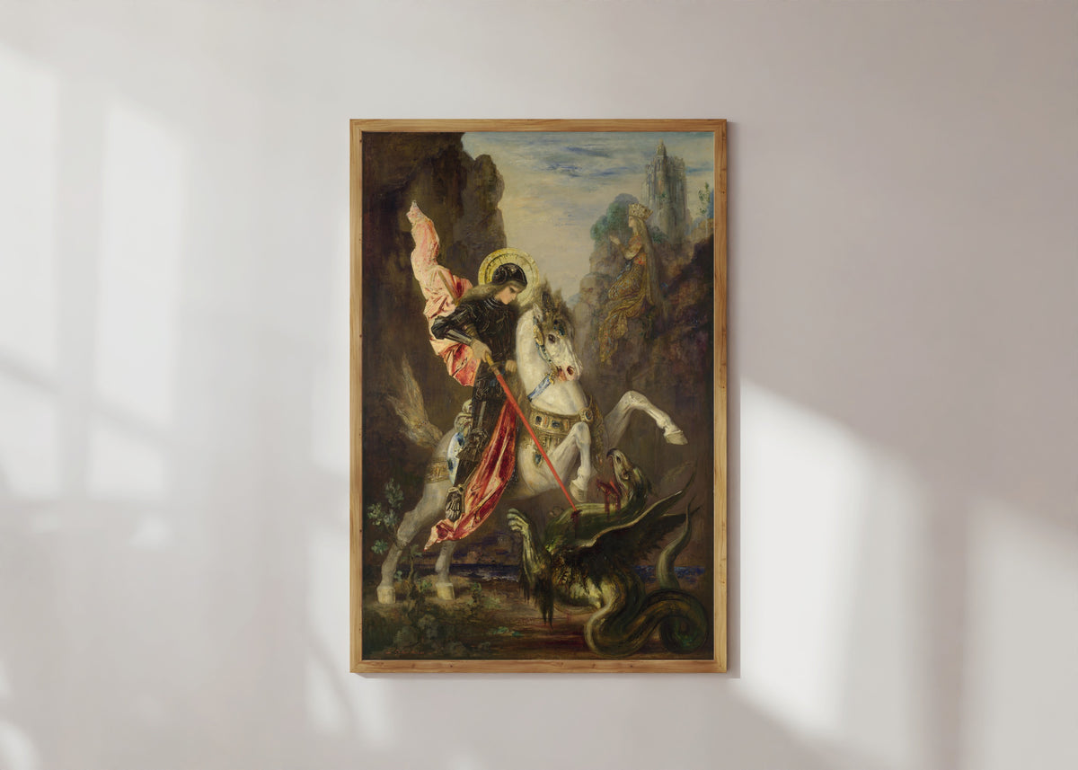 Framed art print of Saint George and the Dragon by Gustave Moreau, in a light wood frame on a sunlit white wall