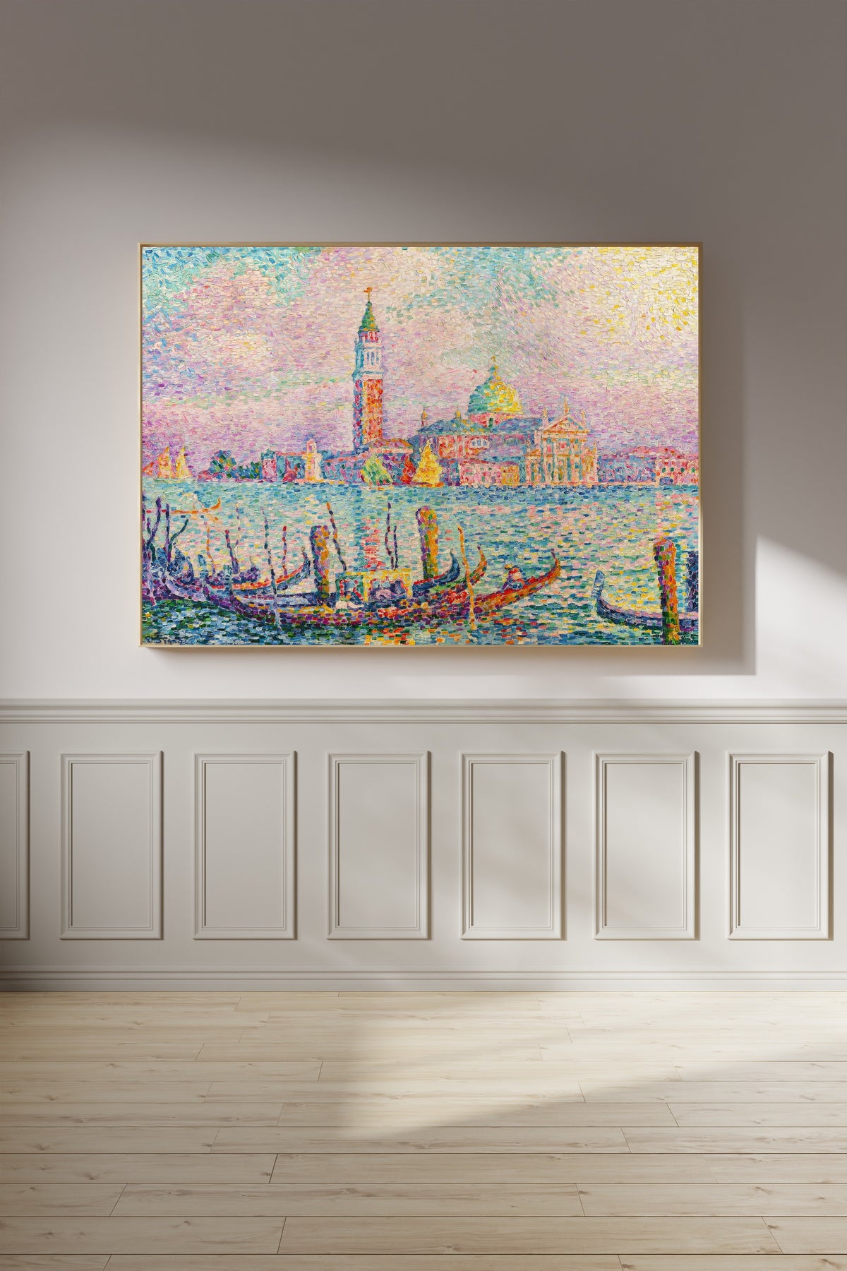 Framed art print of Saint-Georges, Sunset, Venice by Paul Signac, on a panelled wall in afternoon light