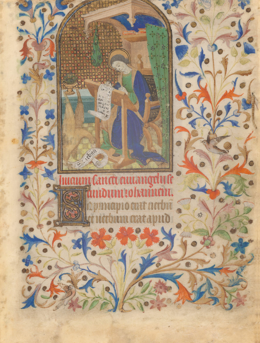 Saint John | Illuminated Manuscript Print shown to scale on a wall above a sofa