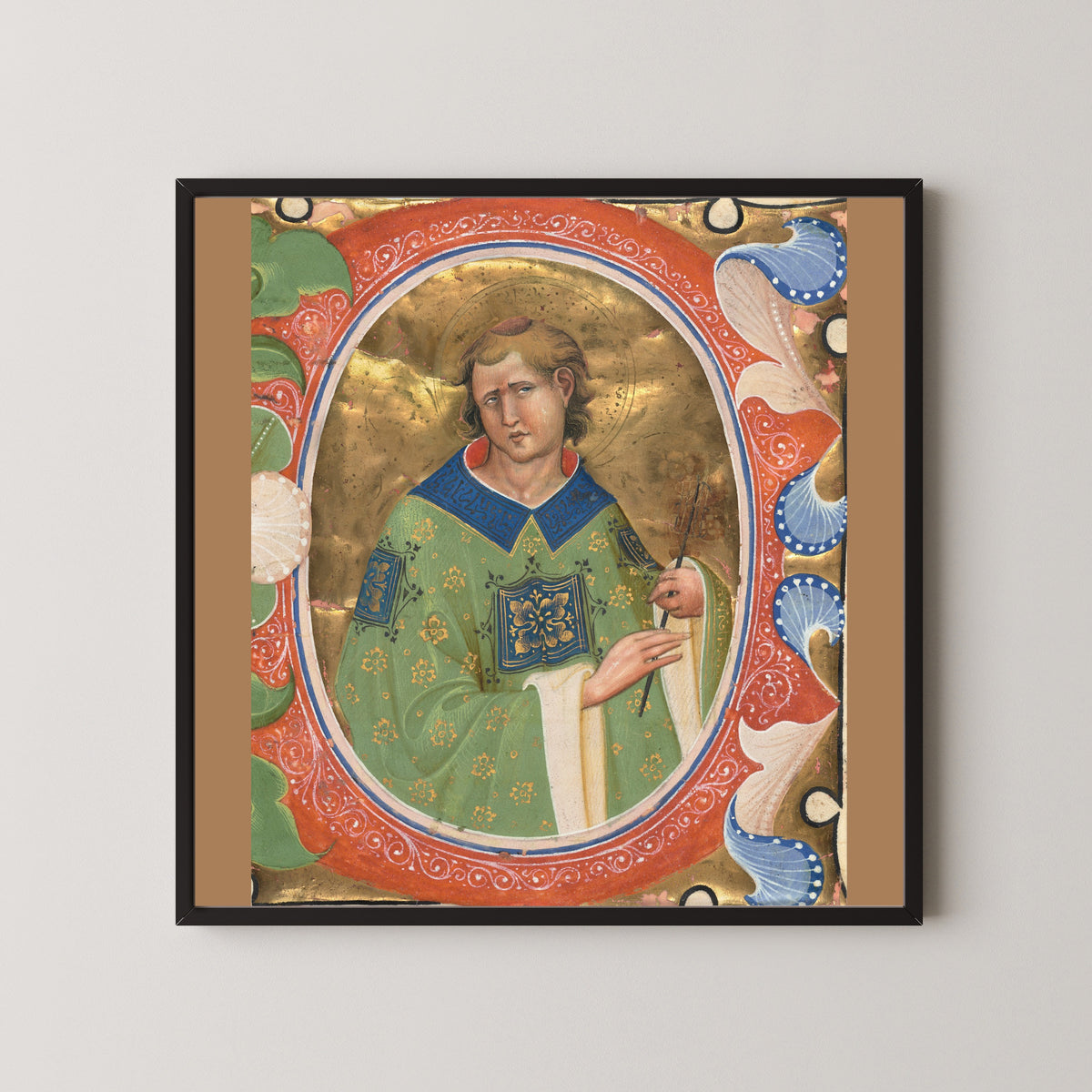 Framed art print of Saint Lawrence by Master of the Murano Gradual, in a black frame on a pale wall