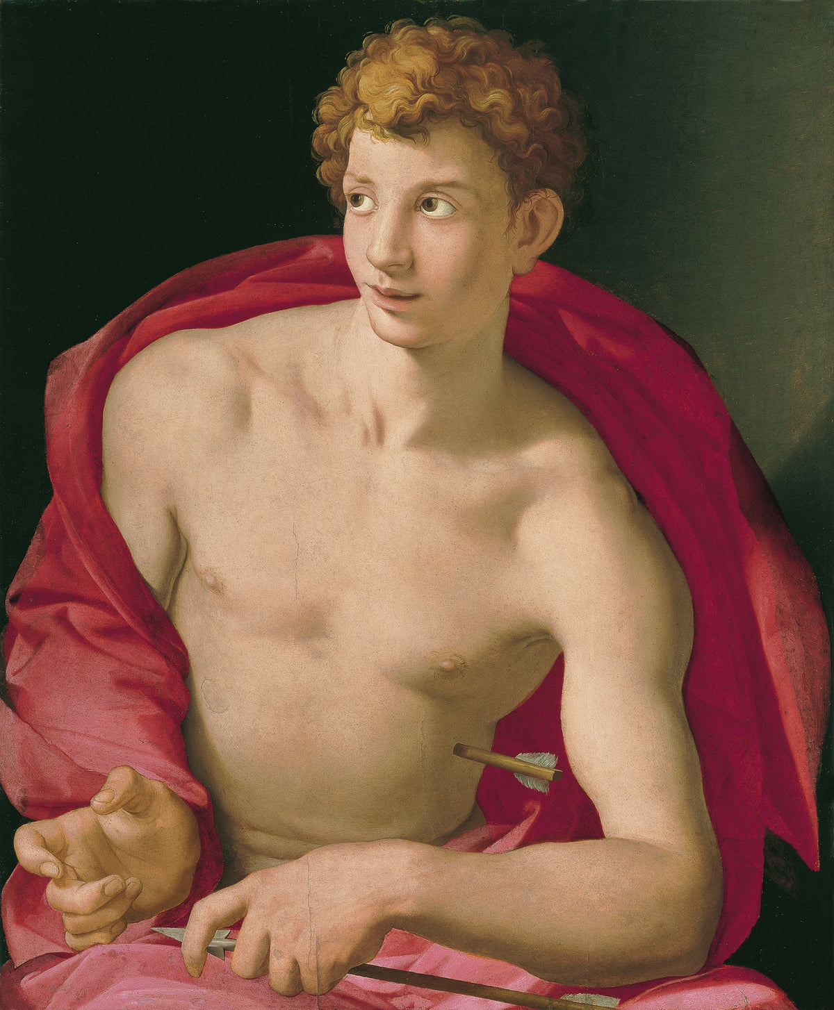 Saint Sebastian by Bronzino — A curly-haired young man in a red drape, an arrow in his side