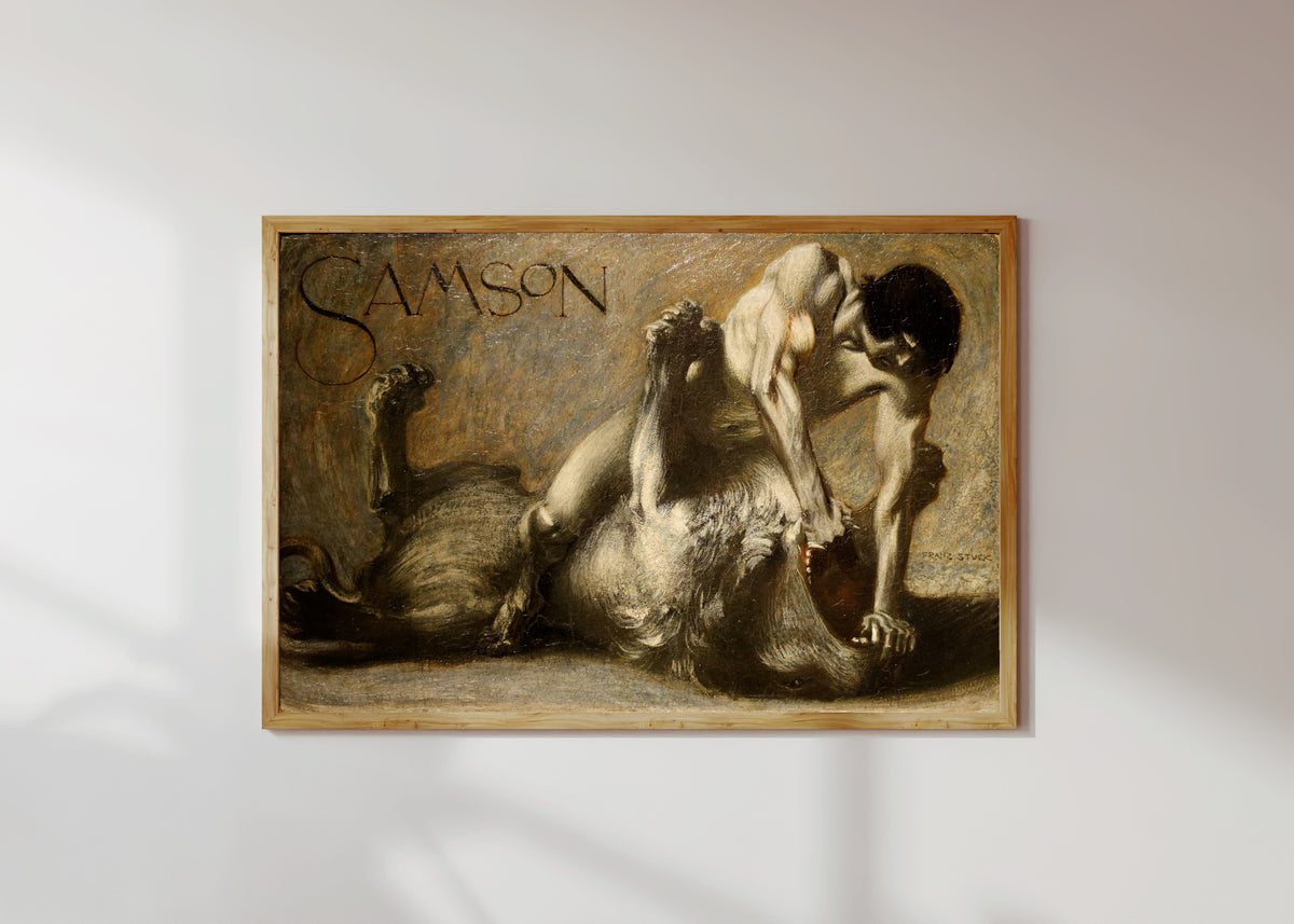 Framed art print of Samson by Franz von Stuck, in a light wood frame on a sunlit white wall